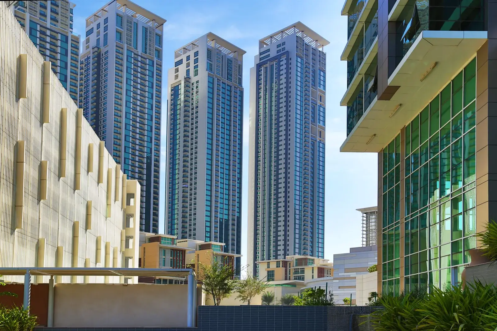 Marina Square waterfront towers with landscaped gardens and promenade views on Al Reem Island Abu Dhabi.
